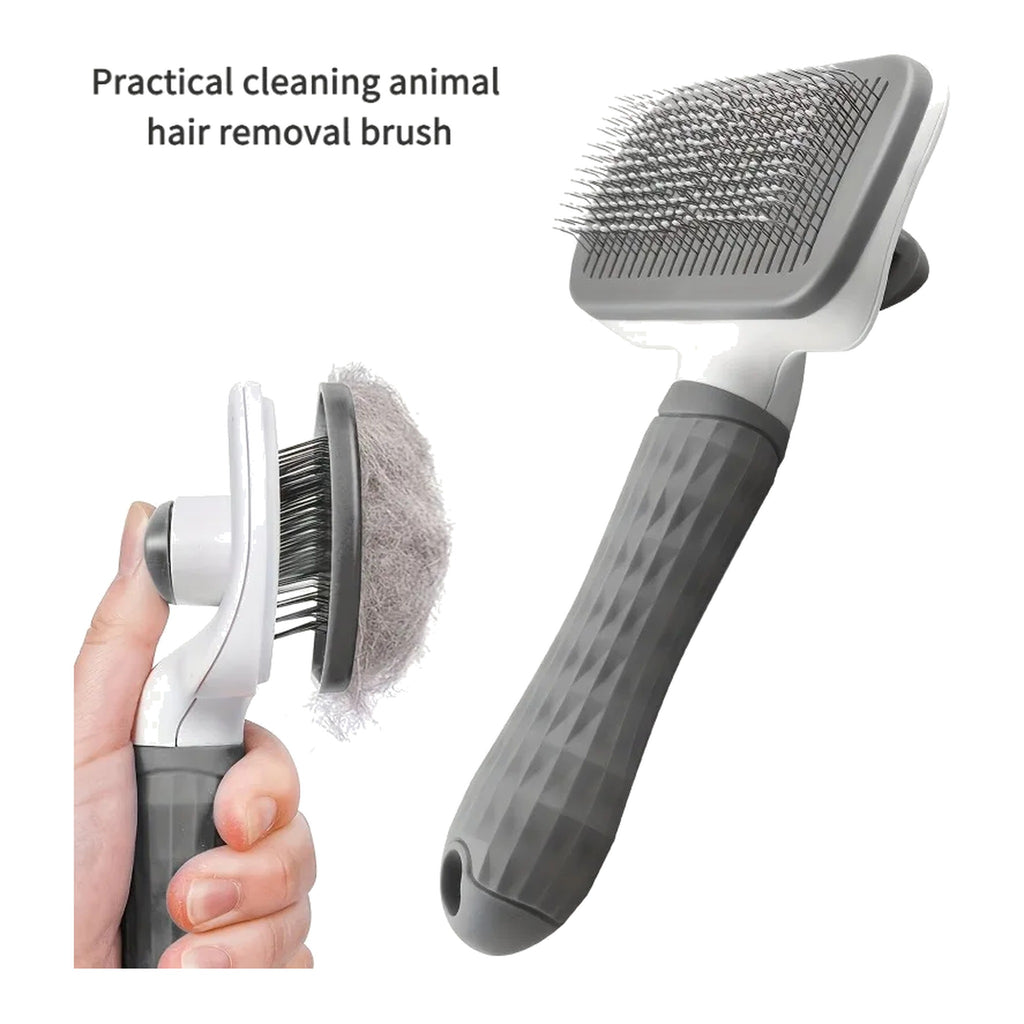 Grey and white self-cleaning slicker brush shown with a hand releasing a pad of fur